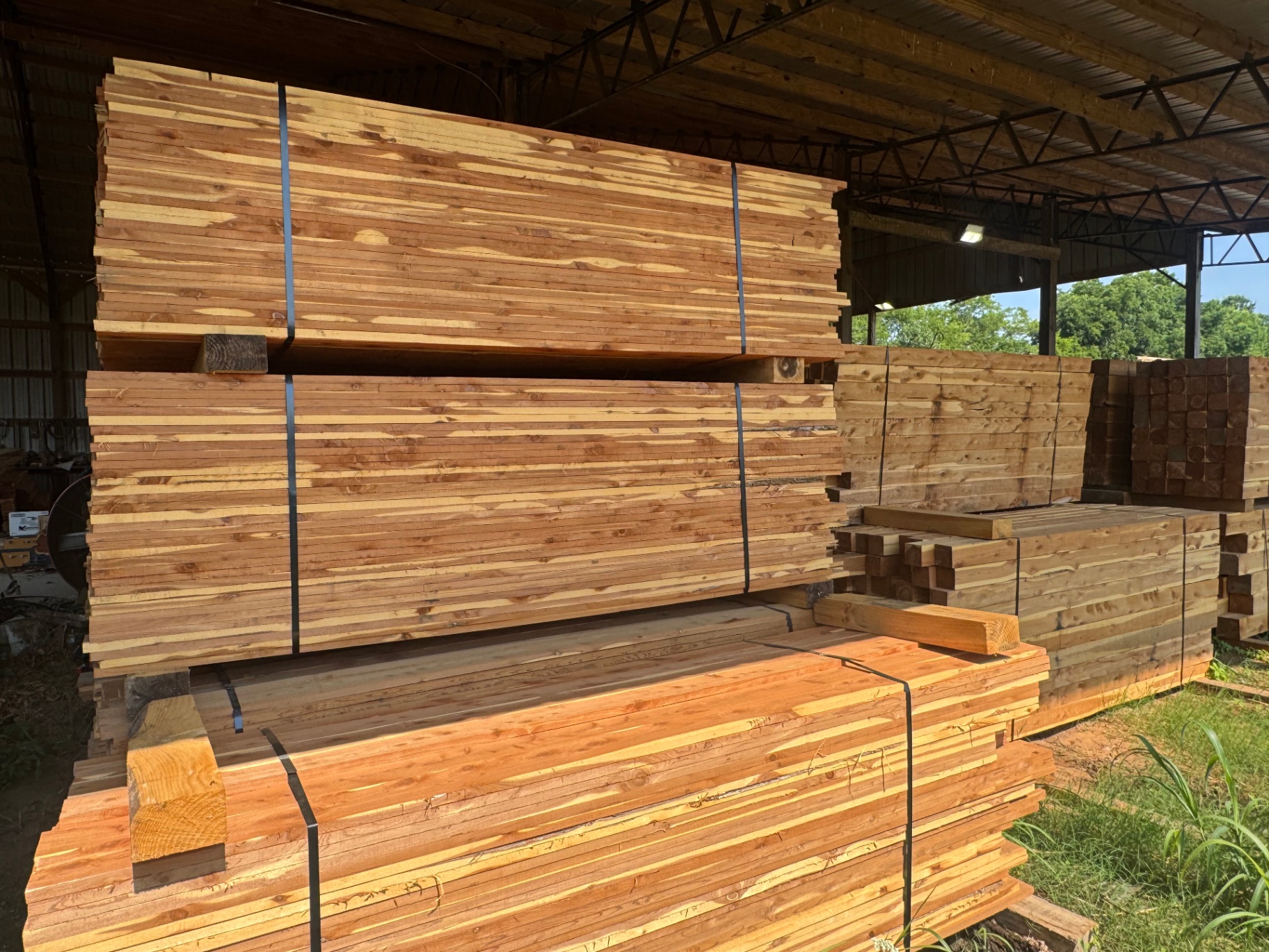 Stacks of finished cedar lumber